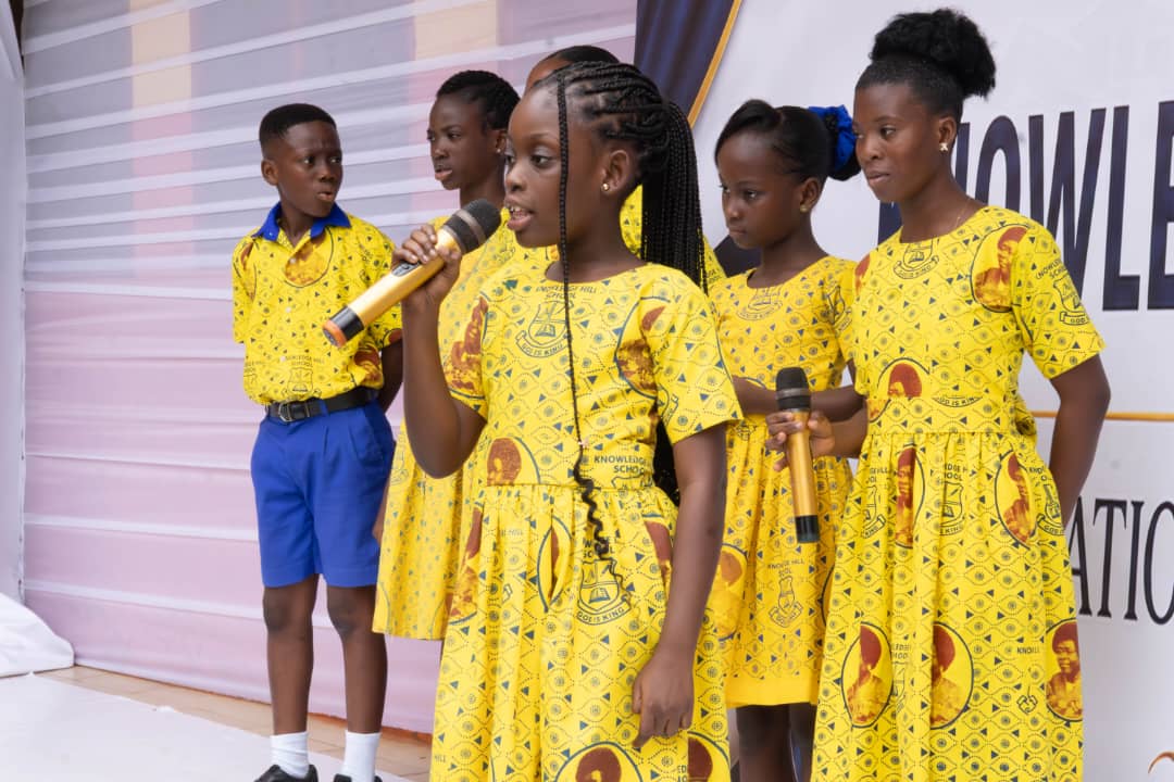 A Knowledge Hill student performing at a school gathering